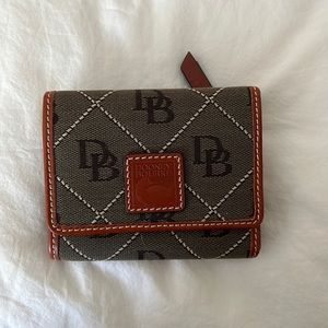 Dooney and burke wallet never used